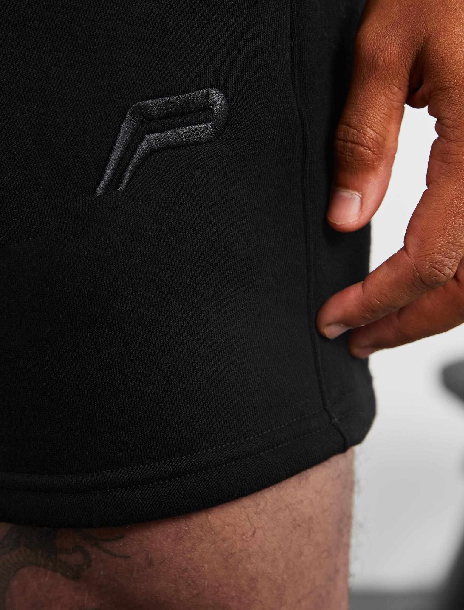 Black Icon Tapered Fleece Shorts | Pursue Fitness